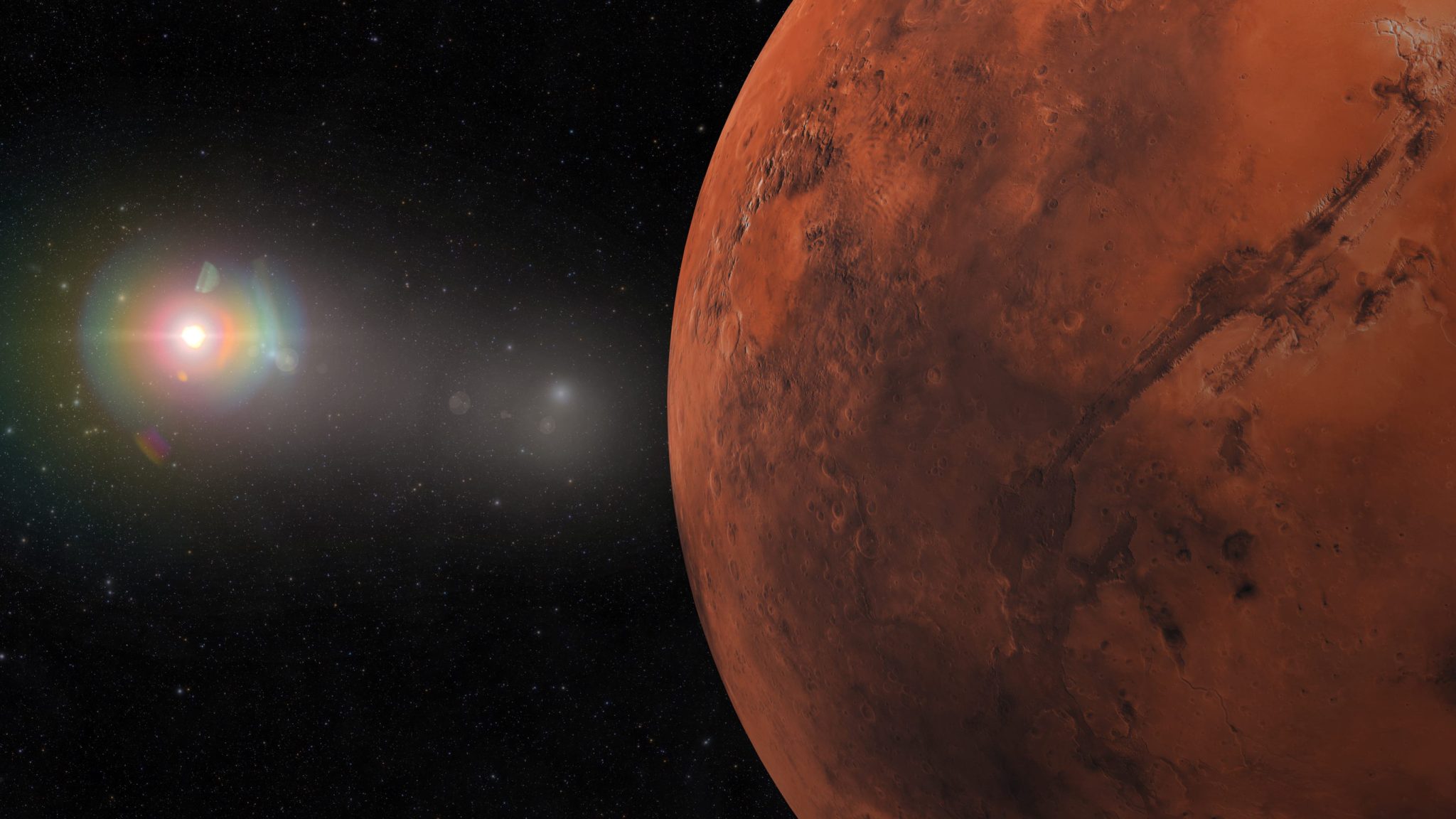 Mars dominates the right half with a starry space background and a bright sun flare on the left.