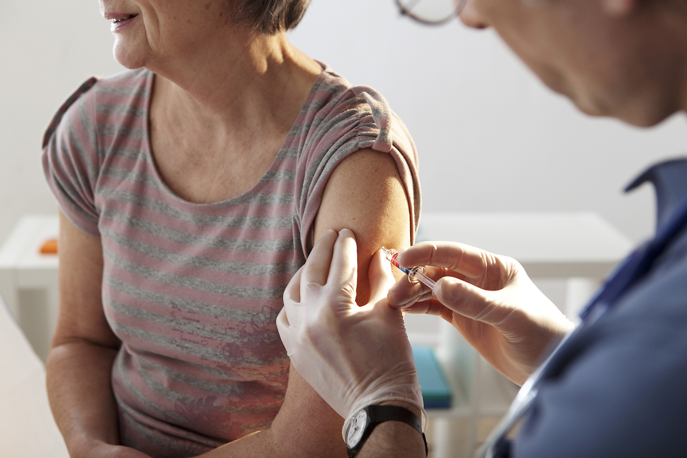 A person receiving a flu shot in October as health experts urge early vaccination amid a faster-than-usual flu season start in 2026