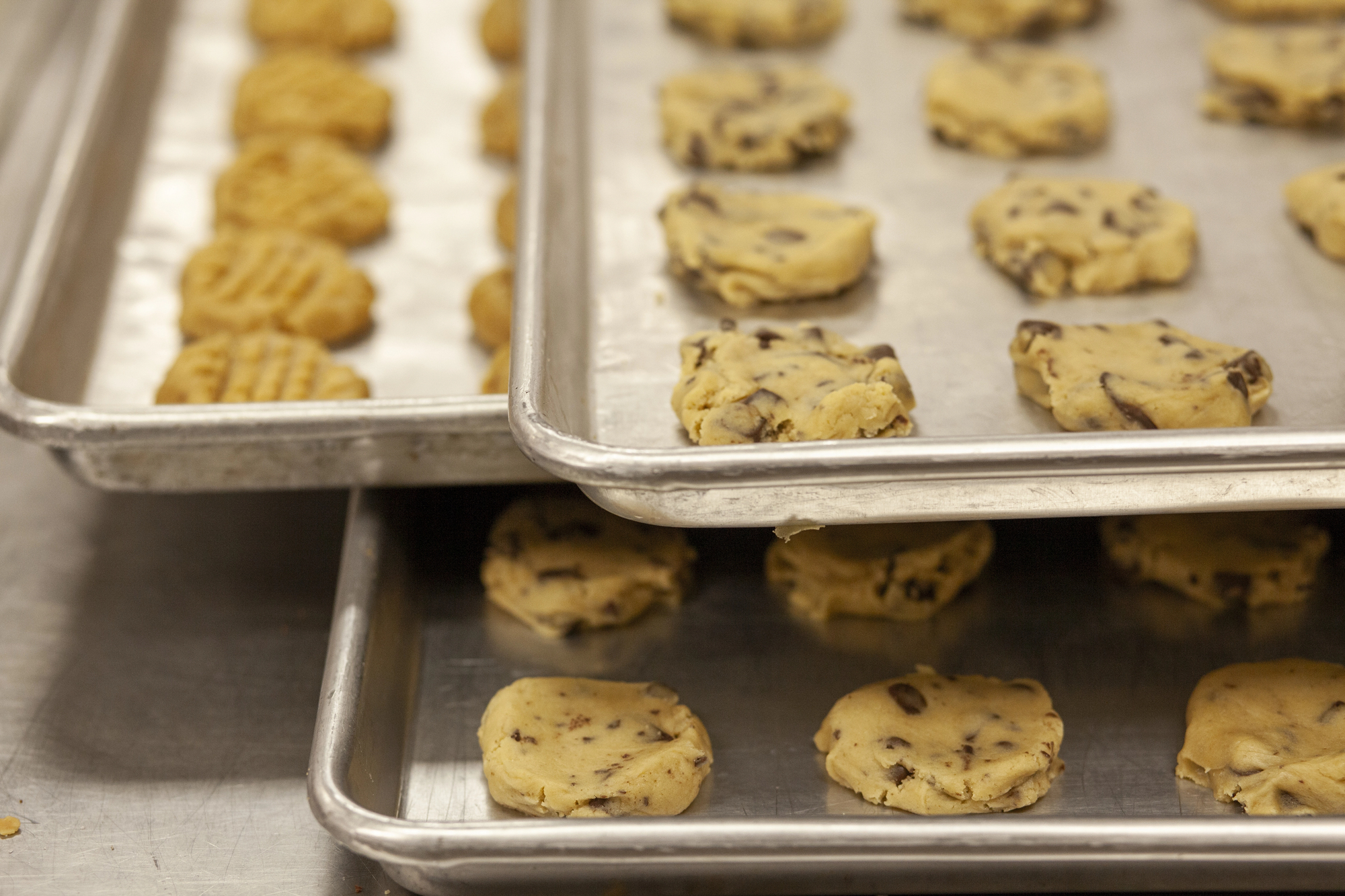 Homemade cookies representing a Baked Bites pop-up event in Frisco, Texas, with proceeds going to local food-insecure families