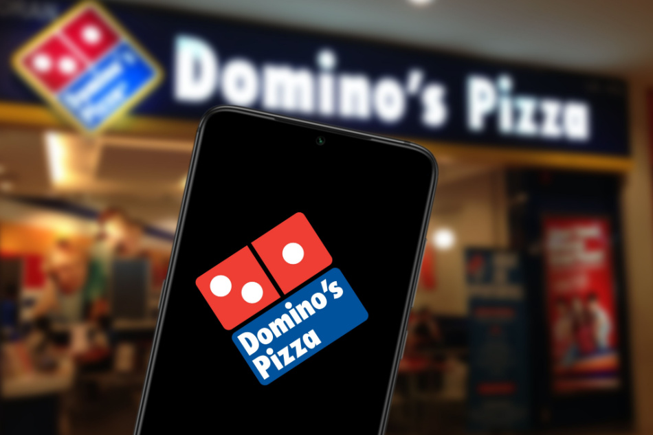 Smart phone with the Domino's Pizza logo is an American fast food restaurant company.