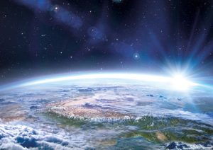 part of Earth seen from space with lens flare sun and space