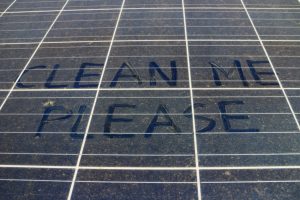 Dirty Dusty Solar Panels with Text Clean Me Please