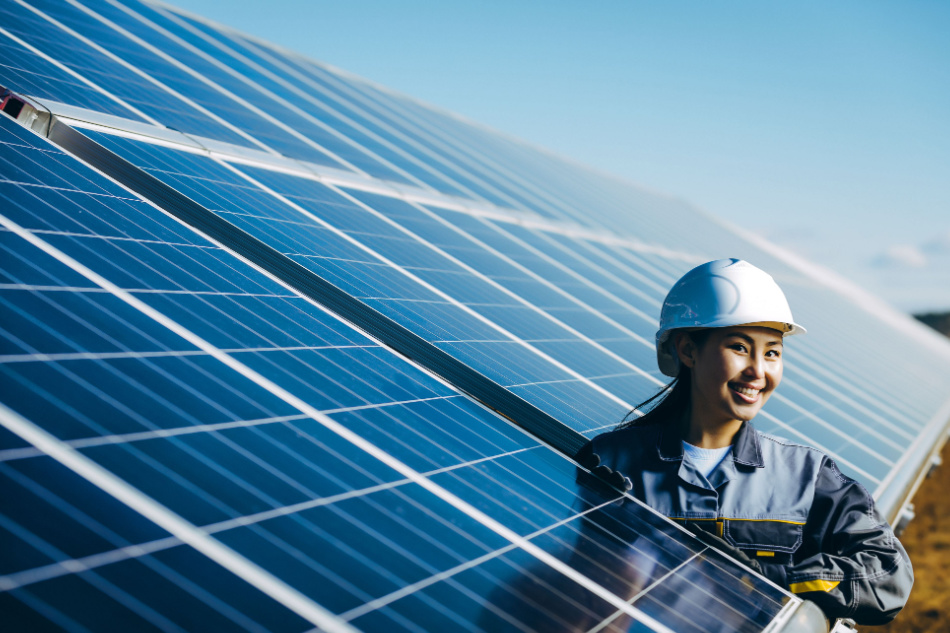 Young asian woman at solar power station