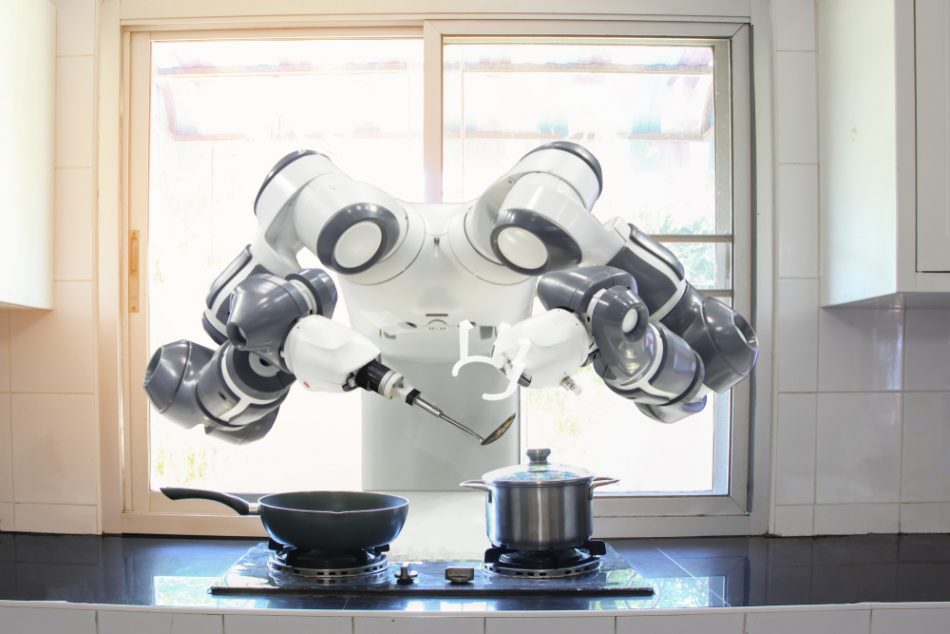 Chef robot cooking in the kitchen of the future homes.