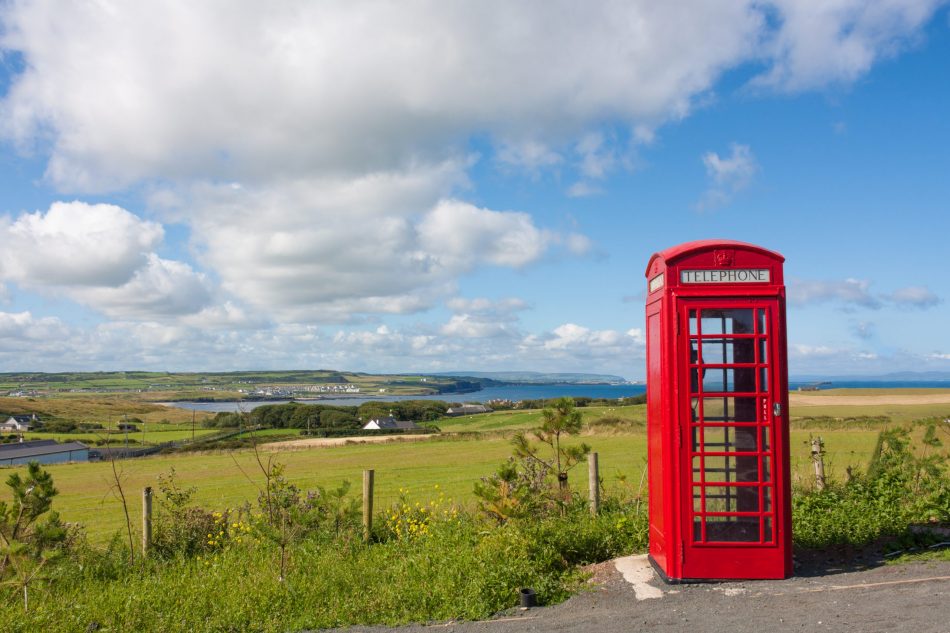 red phone booth in uk countryside
