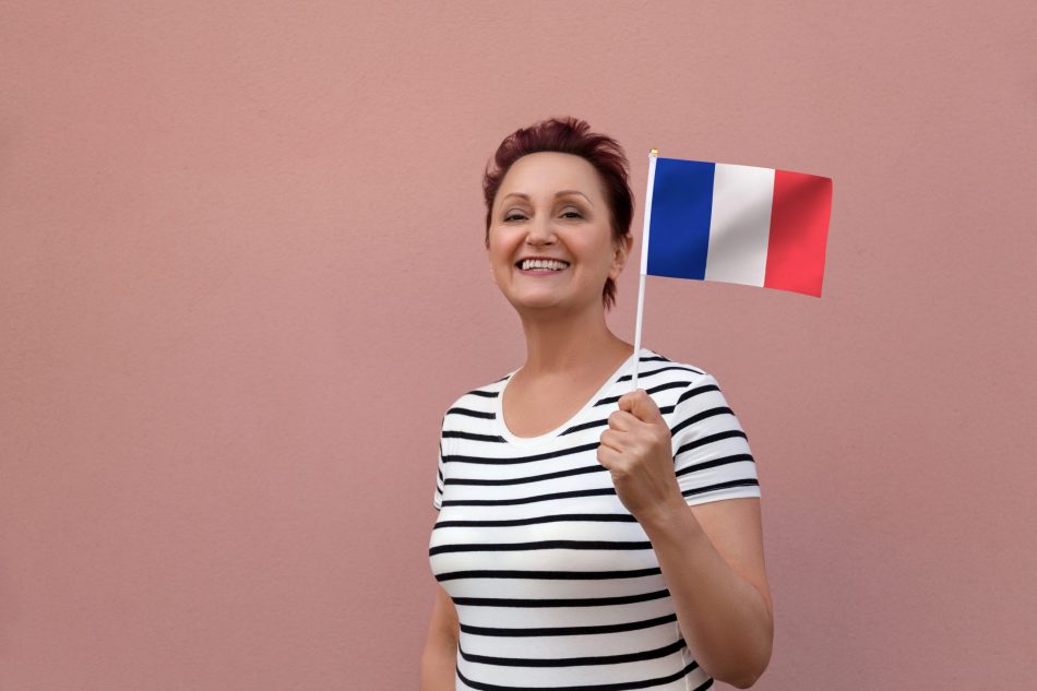 Woman holding French flag