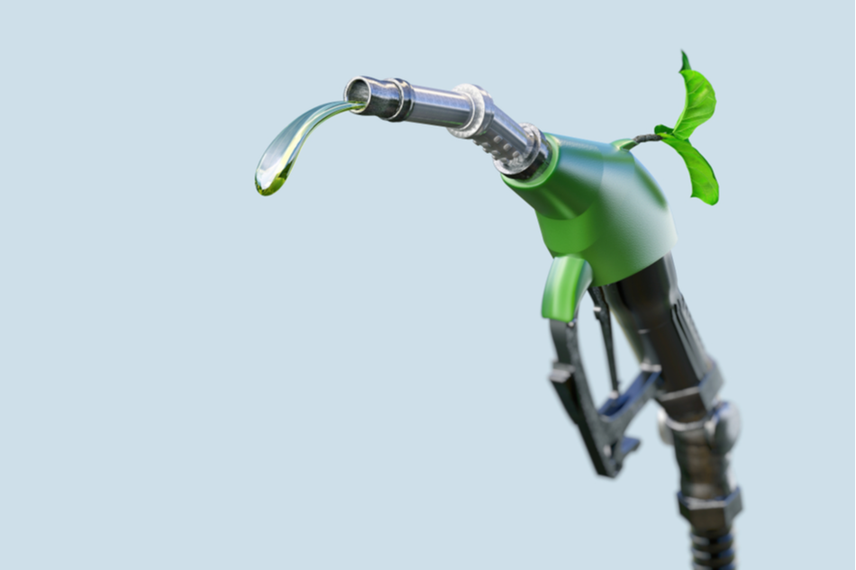 Gas pump nozzle with gasoline or biofuel drop and growing green sprout symbolizing environmental friendliness, isolated. Ecological biofuel concept. 3D illustration