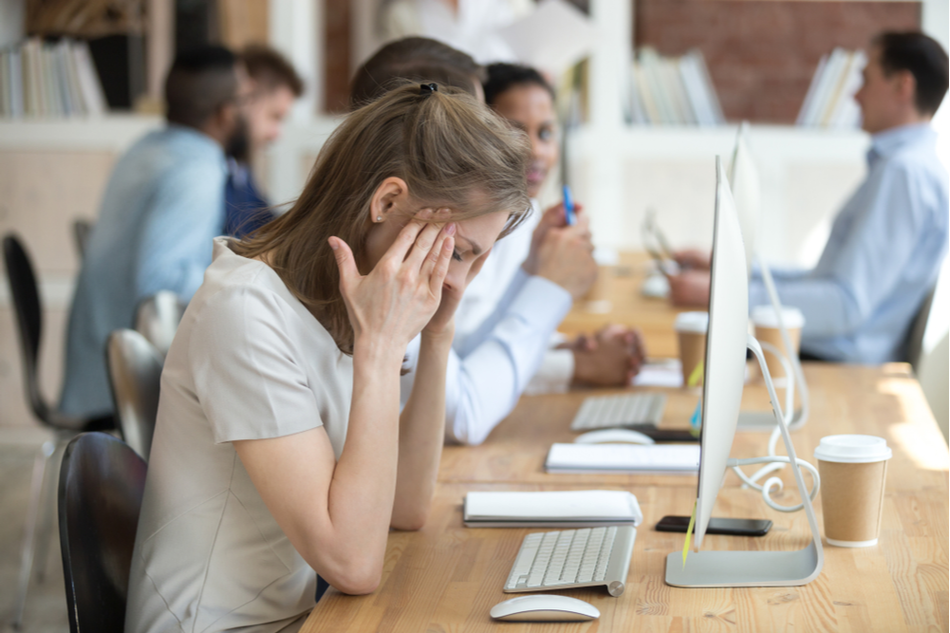 stressed female employee have anxiety attack at workplace