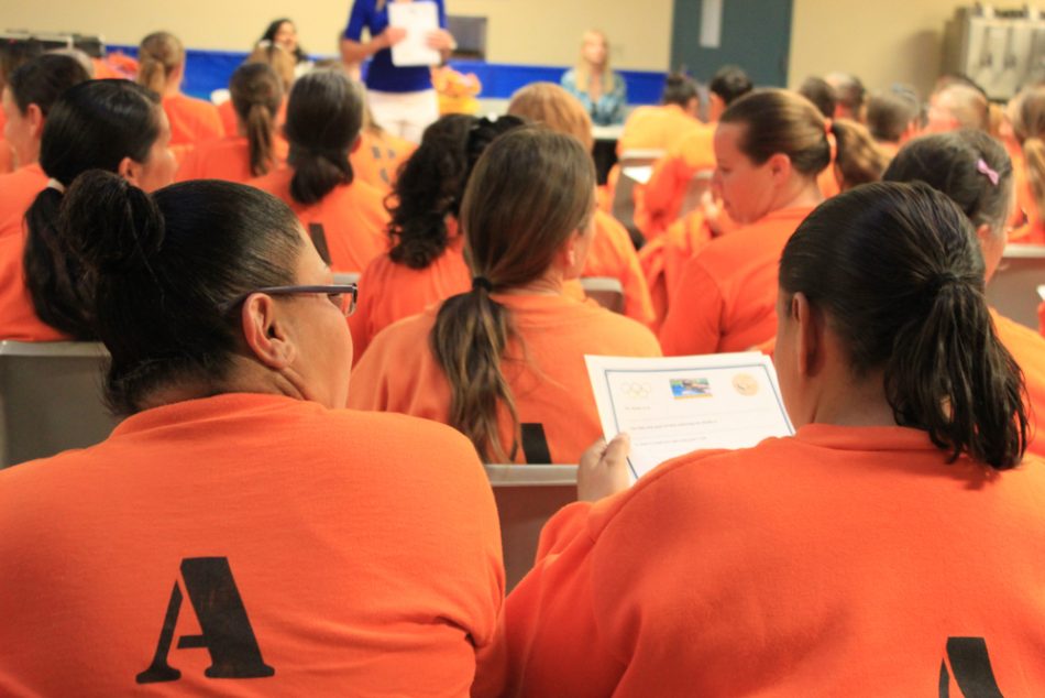 female inmates in classroom set in prison
