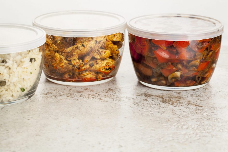 stir fry dinner meal or leftovers stored in glass containers