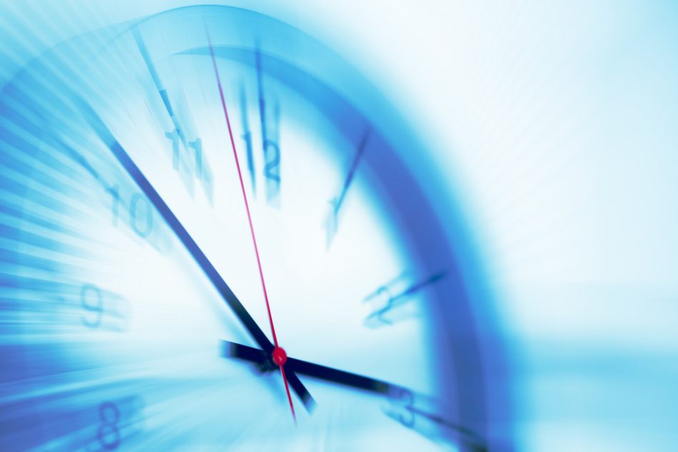 Fast speeding clock represents lateness concept.
