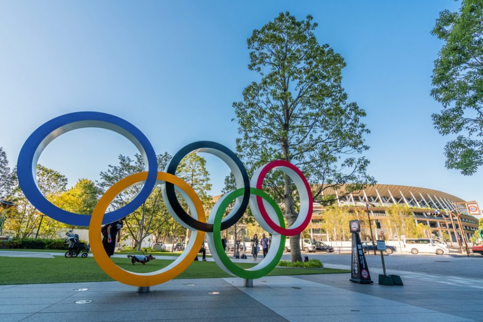 The five ring symbol of the Olympic Games at tokyo museum and new stadium in background. Japan will host the Tokyo 2020 summer olympics and Paralympic.