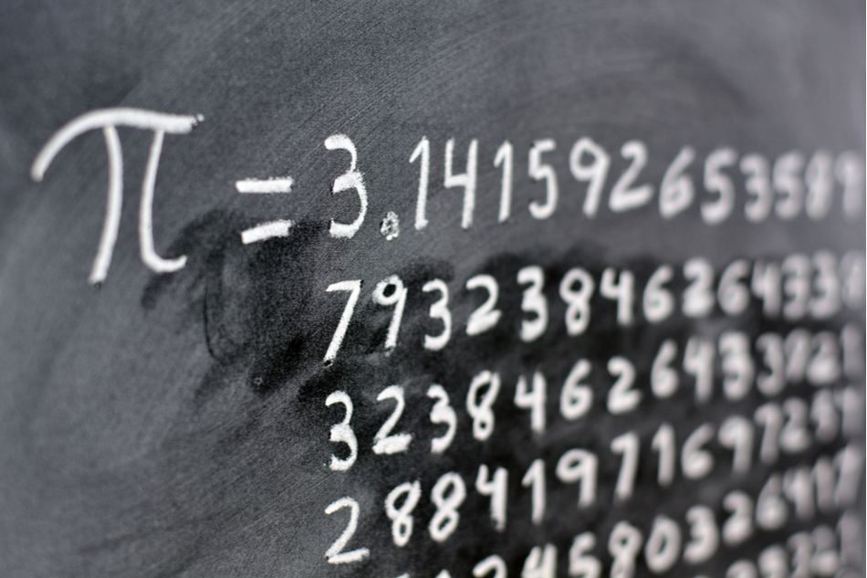 a blackboard with many digits of pi written down
