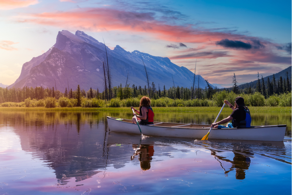 Two people canoeing in Banff National Park in Canada