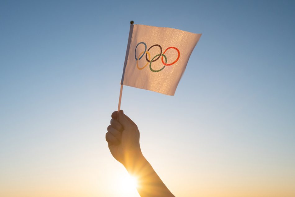 Olympic flag at sunset