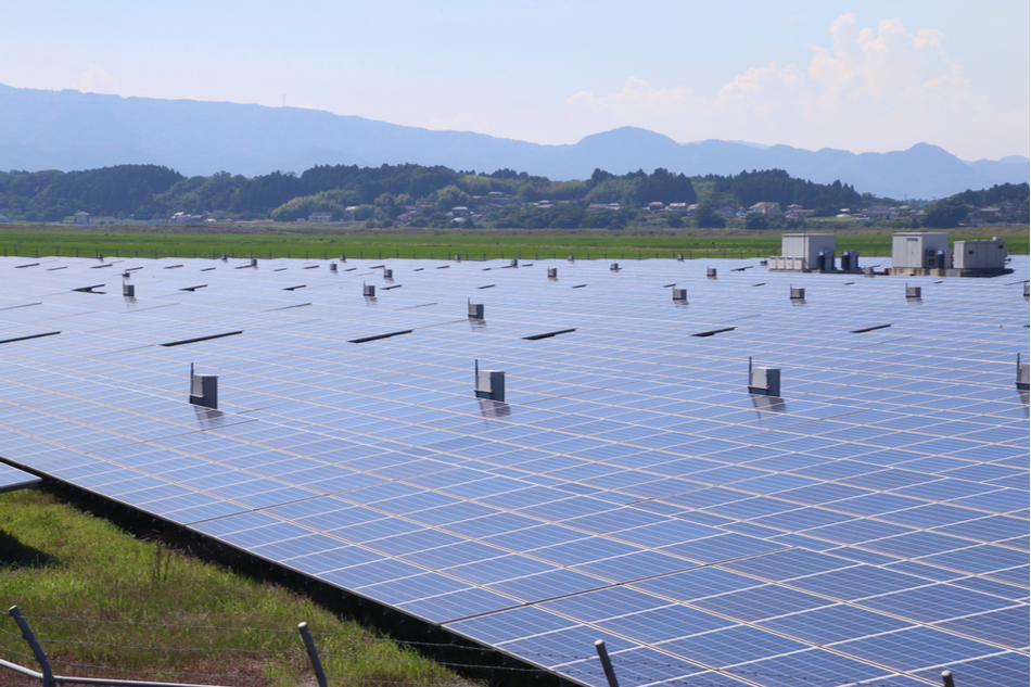 Solar farms in Fukushima, with mountains in the background