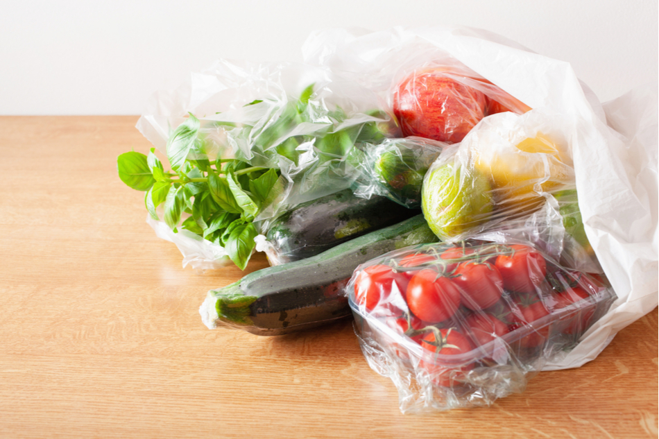 Fresh produce wrapped in plastic inside a plastic bag