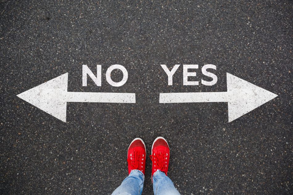 two feet stand between an arrow pointing left that says NO and an arrow pointing right that says YES