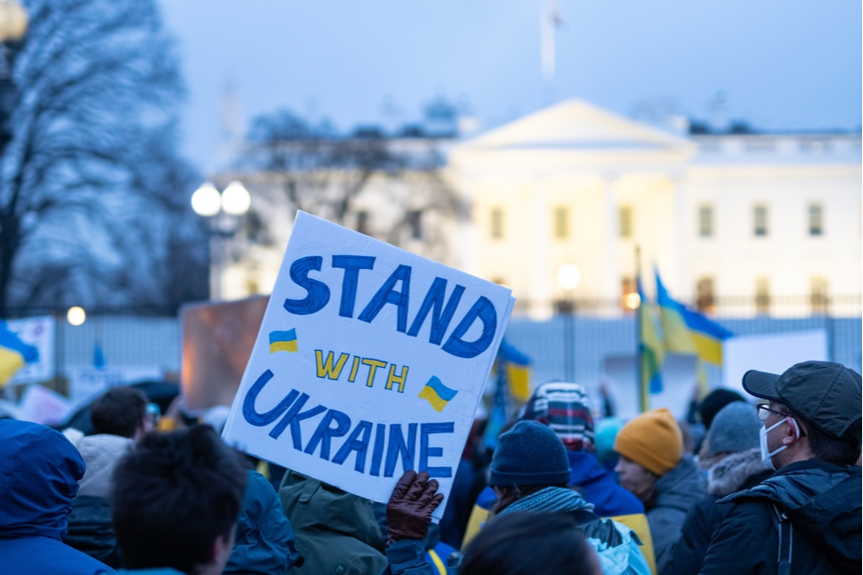 protestors in front of the White House with signs reading STAND WITH UKRAINE