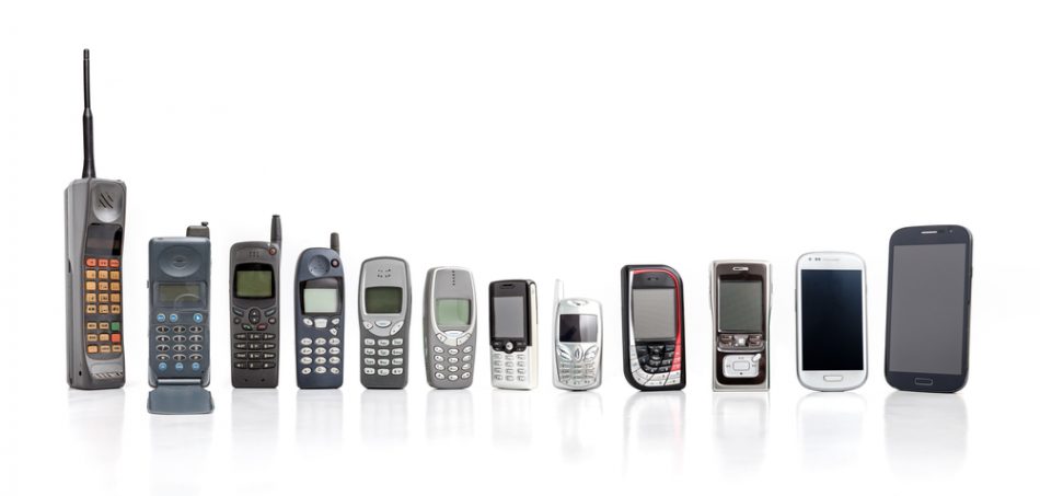 Mobile phone from past to present on white background.