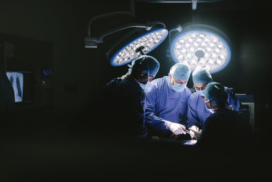 Surgeons working on a patient