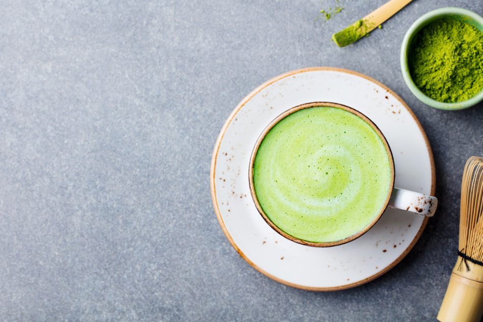 Matcha green tea latte in a cup.