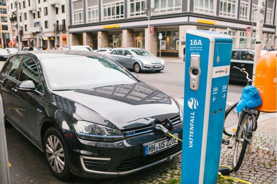 Electric Volkswagen charging at a public charging spot in Germany